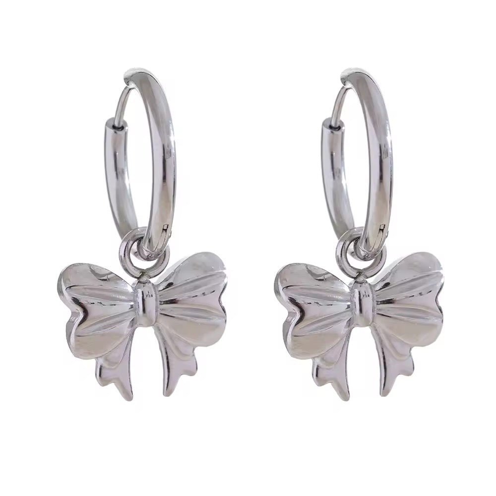 Silver Bow Huggie Earrings - ILLUSIVE JEWELS